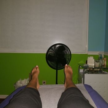 Chinese Herbs Acupuncture Center - a person's feet in front of a fan - Acupuncture Near Me - Hoover, Alabama Chinese Herbs Acupuncture Center - a person's feet in front of a fan - Acupuncture Near Me - Hoover, Alabama