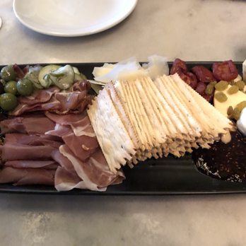 Smith Tower Observatory Bar - Artisan charcuterie and cheese plate - Cocktail Bars Near Me - Seattle, Washington Smith Tower Observatory Bar - Artisan charcuterie and cheese plate - Cocktail Bars Near Me - Seattle, Washington