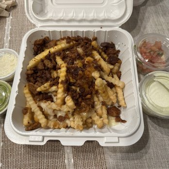 Taco Chico - Loaded fries with pastor ($14.95) - Tacos Near Me - Tustin, California Taco Chico - Loaded fries with pastor ($14.95) - Tacos Near Me - Tustin, California