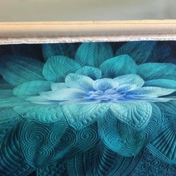 Aurora Quilts - Custom quilting on a Dream Big panel. These panels are like potatoes chips, you need more than one. Fun to quilt.
