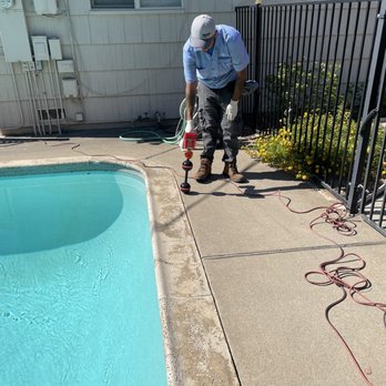 The Plumbing Machines - Proof of root removal and Eric showing where roots were found. Under the deck. - Plumbing Near Me - Sacramento, California