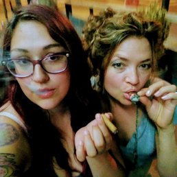 Enjoying cigars from tobacco leaf on Alameda Enjoying cigars from tobacco leaf on Alameda