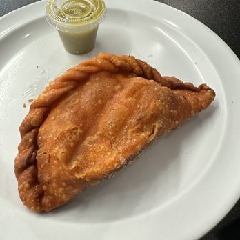 Salt & Pepper Grill - Beef empanada comes with a Verde hot salsa - Restaurants Near Me - Readington Township, New Jersey
