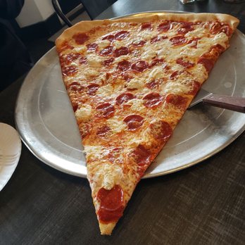 Enzo's Pizza - Giant pie slice - Pizza Near Me - Atlanta, Georgia Enzo's Pizza - Giant pie slice - Pizza Near Me - Atlanta, Georgia