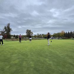 Fiddler's Elbow Country Club - Part of the golf clinic they provide. Lesson on putting
