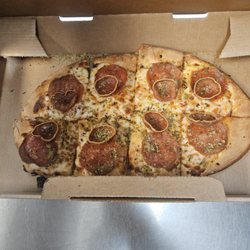Pizza Hut - I like the new flatz pizza for only $5 before 5pm