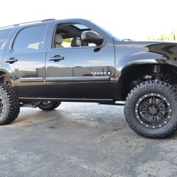 Ben Lifted 4 Wheel Drive & Hitch - 07'Tahoe -4"Rancho Lift, AMP Powersteps, ProComp Wheels, Mickey Thompson Tires, Custom F&R LED Blacked out Lights