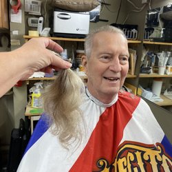 Luigi's Old Style Barbershop - Hubby and his new hair