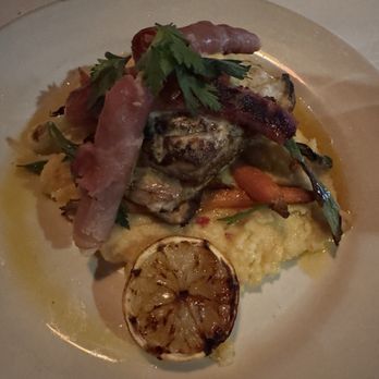 Trattoria Marcella - Sea bass fish special over sun dried tomato potenta and prosciutto wrapped spring onions - Italian Near Me - Saint Louis, Missouri Trattoria Marcella - Sea bass fish special over sun dried tomato potenta and prosciutto wrapped spring onions - Italian Near Me - Saint Louis, Missouri