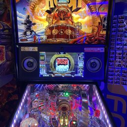 Playing RUSH pinball jamming to Huey Lewis and the News!      I can't make this up