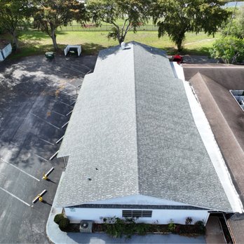 Pressley Pro - After: Commercial Reroof (Sistering Rafters, Replace Sheathing Boards, New Shingles) - General Contractors Near Me - Davenport, Florida Pressley Pro - After: Commercial Reroof (Sistering Rafters, Replace Sheathing Boards, New Shingles) - General Contractors Near Me - Davenport, Florida