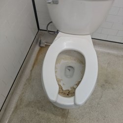 7-Eleven - This toilet looks like it's never been cleaned and there was filth all over the floor around it and the toilet itself.