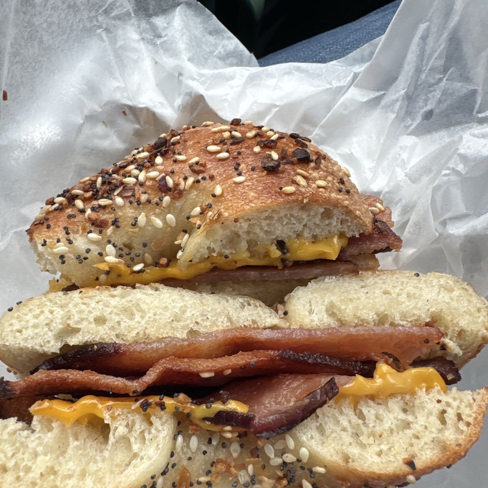 Everything bagel toasted with bacon and American cheese Everything bagel toasted with bacon and American cheese