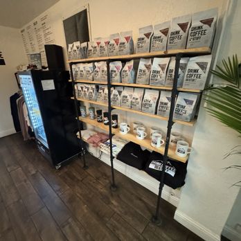 Drink Coffee Do Stuff - Wall of beans and merch - Coffee Roasteries Near Me - South Lake Tahoe, California