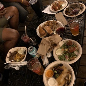 The Pass Kitchen - A group of us savagely eating and drinking everything! Lol - Food Trucks Near Me - Altamonte Springs, Florida
