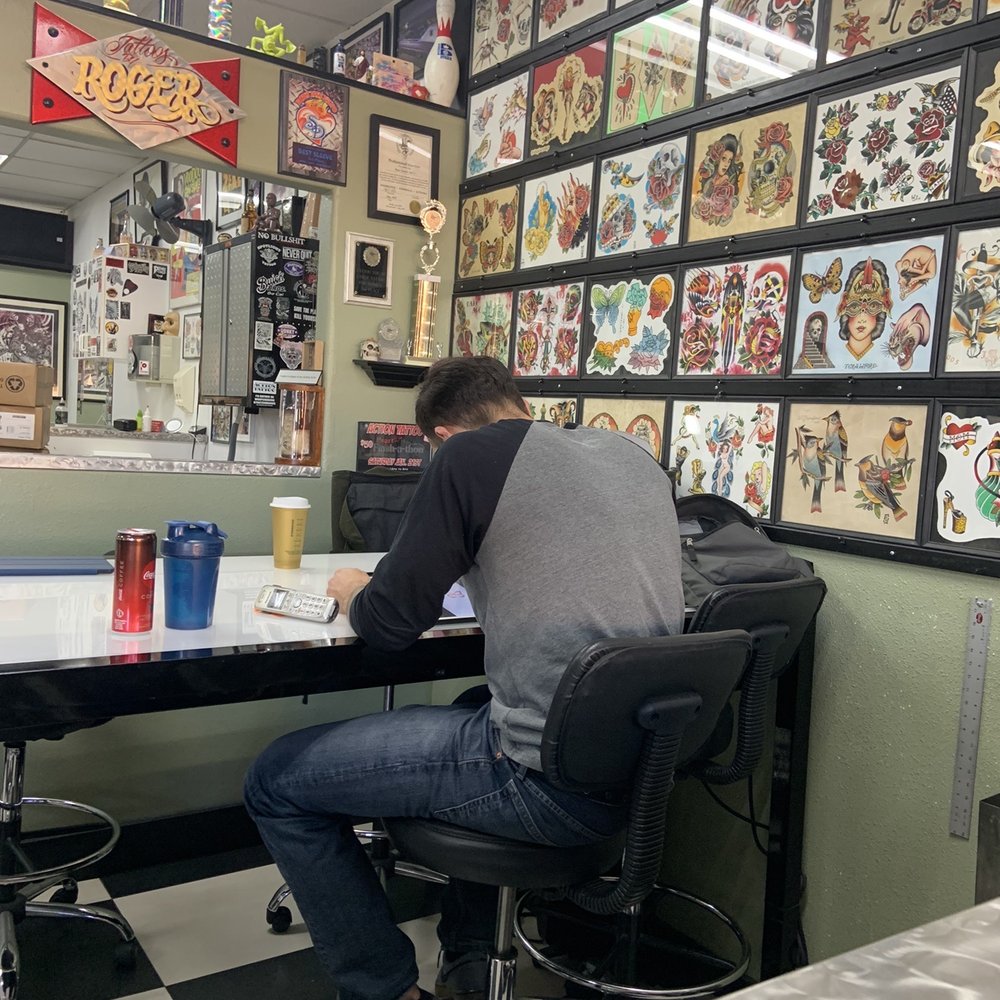 Action Tattoo - Rick sketching my tattoo on his iPad. - Tattoo Near Me - Anaheim, California