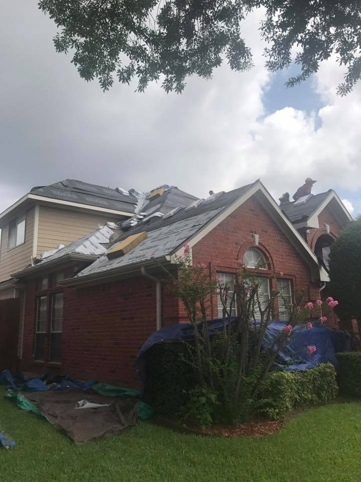 Slide of Cowboys Roofing