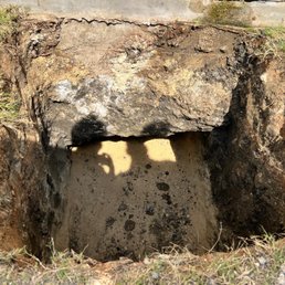 Unwanted dugout made by Reliant Plumbing causing damage to my property.