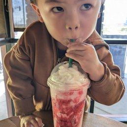 He loves the strawberry frappe He loves the strawberry frappe
