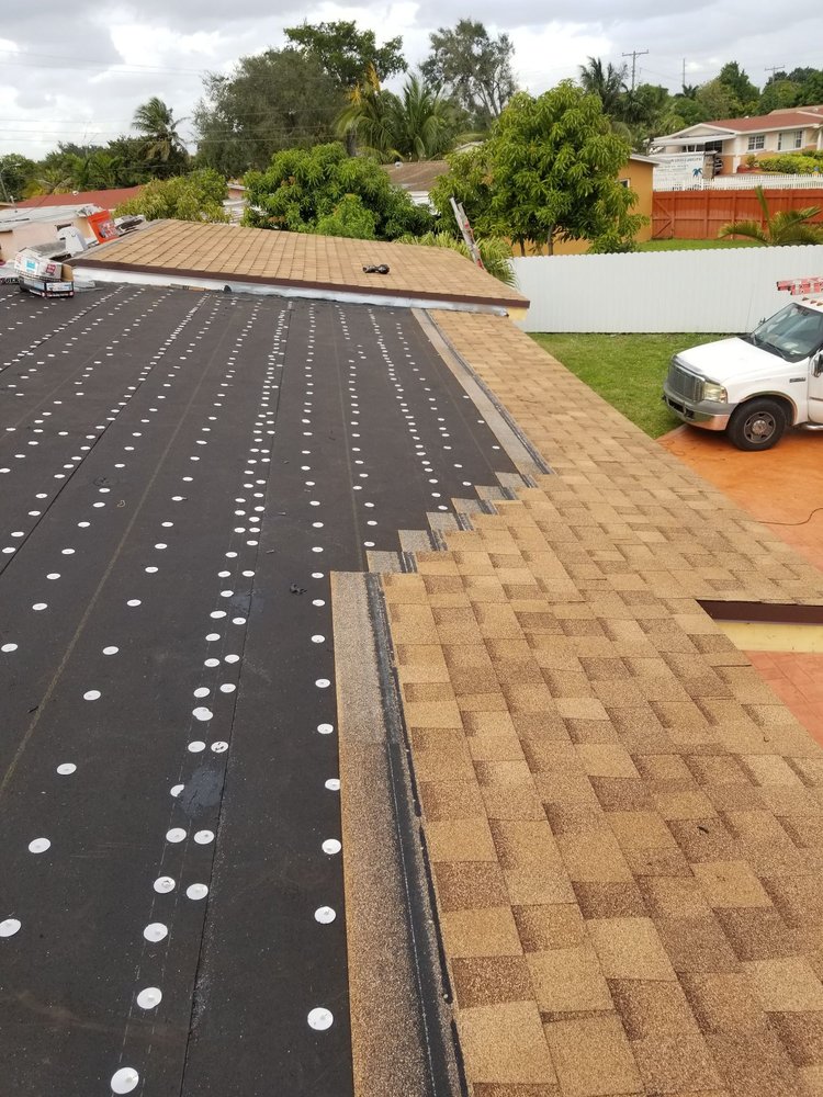 Slide of Dynasty Roofing