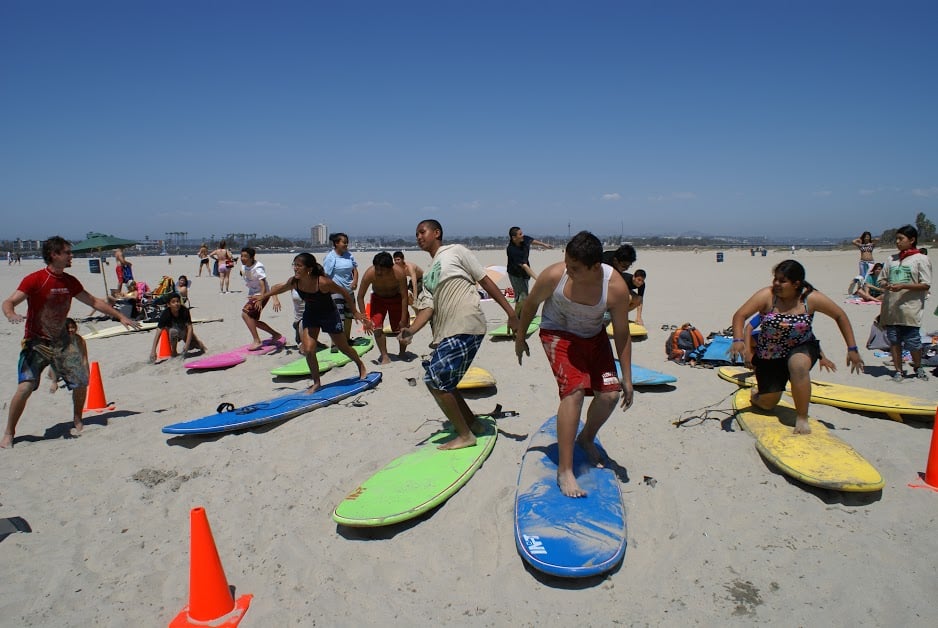 Menehune Surf School Logo