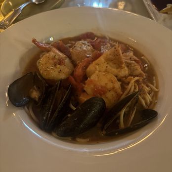 Di Vino Rosso - Cioppino - shrimp, mussels, scallop and seasonal fish, tomato saffron brodo spaghetti - Italian Near Me - Columbia, South Carolina Di Vino Rosso - Cioppino - shrimp, mussels, scallop and seasonal fish, tomato saffron brodo spaghetti - Italian Near Me - Columbia, South Carolina