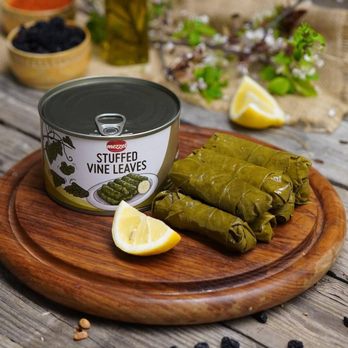 Mediterranean food market - a can of stuffed vine leaves and a lemon slice - International Grocery Near Me - Levittown, Pennsylvania Mediterranean food market - a can of stuffed vine leaves and a lemon slice - International Grocery Near Me - Levittown, Pennsylvania