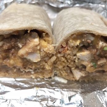 The Burrito Shop - Cross section of the chicken super burrito. It was just ok :/ - Mexican Near Me - Oakland, California