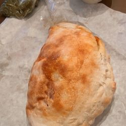 Maria's Pizza - Half of a regular pizza pocket with ranch and jalapeños (we ordered a full one, but the half slice is for the picture)