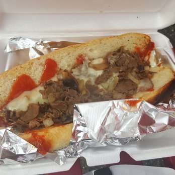 The Dog House - a meatball sandwich in a styrofoam container - Food Trucks Near Me - Tampa, Florida The Dog House - a meatball sandwich in a styrofoam container - Food Trucks Near Me - Tampa, Florida