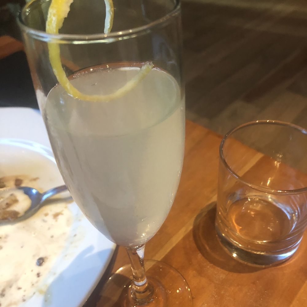 Roaring Fork - French 75 with kettle one - New American Near Me - Austin, Texas Roaring Fork - French 75 with kettle one - New American Near Me - Austin, Texas