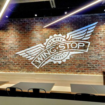 Wingstop - Logo on wall - Chicken Wings Near Me - Toronto, Ontario