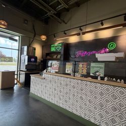 Green District Salads - Veterans Parkway - Views toward entrance of store and pickup order cubbies