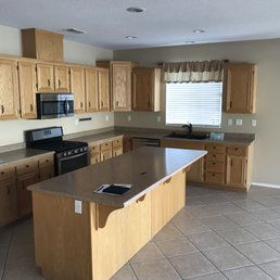 Before: brown and dull. Fake laminate counter Before: brown and dull. Fake laminate counter