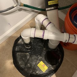 Des Moines Radon - Mitigation pipe installed in sump pit in basement with viewing glass.