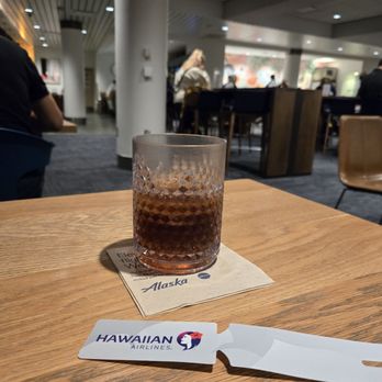 Alaska Lounge - Sipping on a soda and waiting for my delayed Hawaiian Airlines flight to HNL - Airport Lounges Near Me - Los Angeles, California Alaska Lounge - Sipping on a soda and waiting for my delayed Hawaiian Airlines flight to HNL - Airport Lounges Near Me - Los Angeles, California