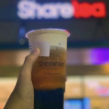 Sharetea - a hand holding a cup of iced coffee - Bubble Tea Near Me - Honolulu, Hawaii Sharetea - a hand holding a cup of iced coffee - Bubble Tea Near Me - Honolulu, Hawaii