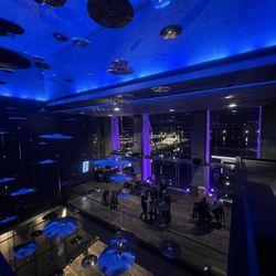 The Anthem - Third floor view of 2nd floor bar and outside balcony