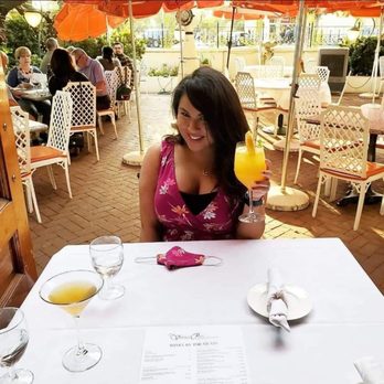 Vintage Press - Outdoor patio enjoying a gin orange press - American Near Me - Visalia, California Vintage Press - Outdoor patio enjoying a gin orange press - American Near Me - Visalia, California