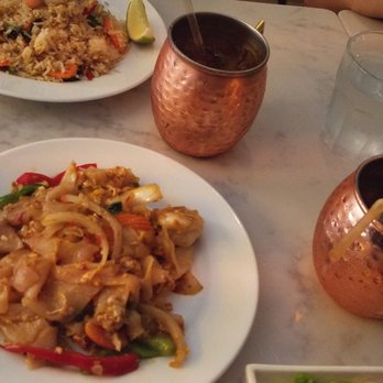 Kin'd - Lunch special - drunken noodles w/ shrimp bottom, spicy Basil fried on top and Tom yum noodle soup peeking @ edge. - Thai Near Me - Fresh Meadows, New York