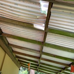 JC Roofing - Broken panel in the carport