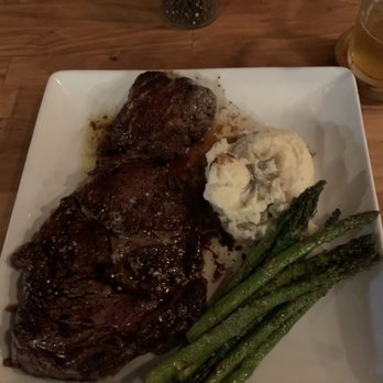 Knife And Stone - Ribeye, mashed potatoes, asparagus - Bars Near Me - Newnan, Georgia Knife And Stone - Ribeye, mashed potatoes, asparagus - Bars Near Me - Newnan, Georgia