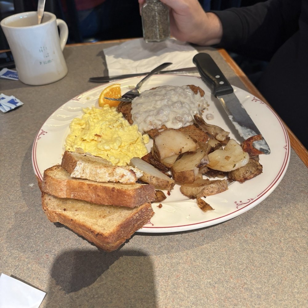 Rosie's Restaurant - Country fried steak with eggs, potatoes and homemade bread - Breakfast & Brunch Near Me - Middlebury, Vermont Rosie's Restaurant - Country fried steak with eggs, potatoes and homemade bread - Breakfast & Brunch Near Me - Middlebury, Vermont