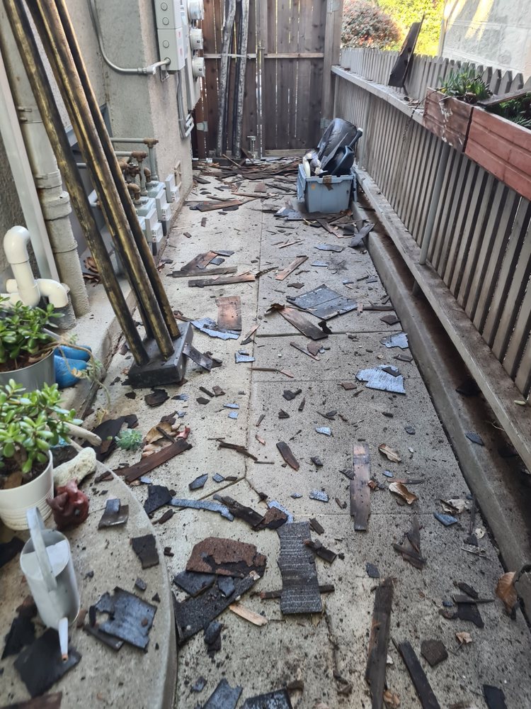 Slide of Lanuza Roofing