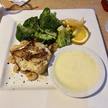 Sealand Seafood & Steak Restaurant - Grilled sea bass with sauce on the side, shrimp, & steamed veggies. - Seafood Near Me - Brenham, Texas