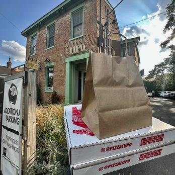Lupo - Exterior of building and to-go order - Pizza Near Me - Louisville, Kentucky Lupo - Exterior of building and to-go order - Pizza Near Me - Louisville, Kentucky