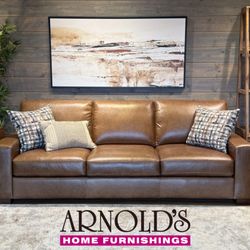 Arnold's Home Furnishings Center - Comfort of Flexsteel leather Sofa~~warm and inviting...