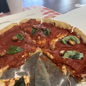 Piccolo's Italian Restaurant - Deep dish margherita with sausage and roasted garlic. Amazing. - Italian Near Me - Lenoir, North Carolina Piccolo's Italian Restaurant - Deep dish margherita with sausage and roasted garlic. Amazing. - Italian Near Me - Lenoir, North Carolina