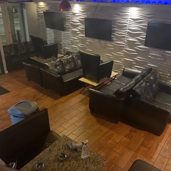 Hookah Joe - a living room with couches and televisions - Hookah Bars Near Me - Royal Oak, Michigan Hookah Joe - a living room with couches and televisions - Hookah Bars Near Me - Royal Oak, Michigan