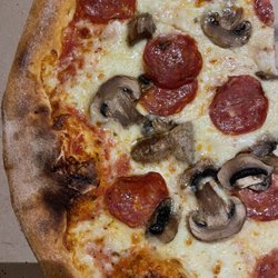 Brezzi's Wood Fired Pizza - Margherita DO with added mushrooms and pepperoni.